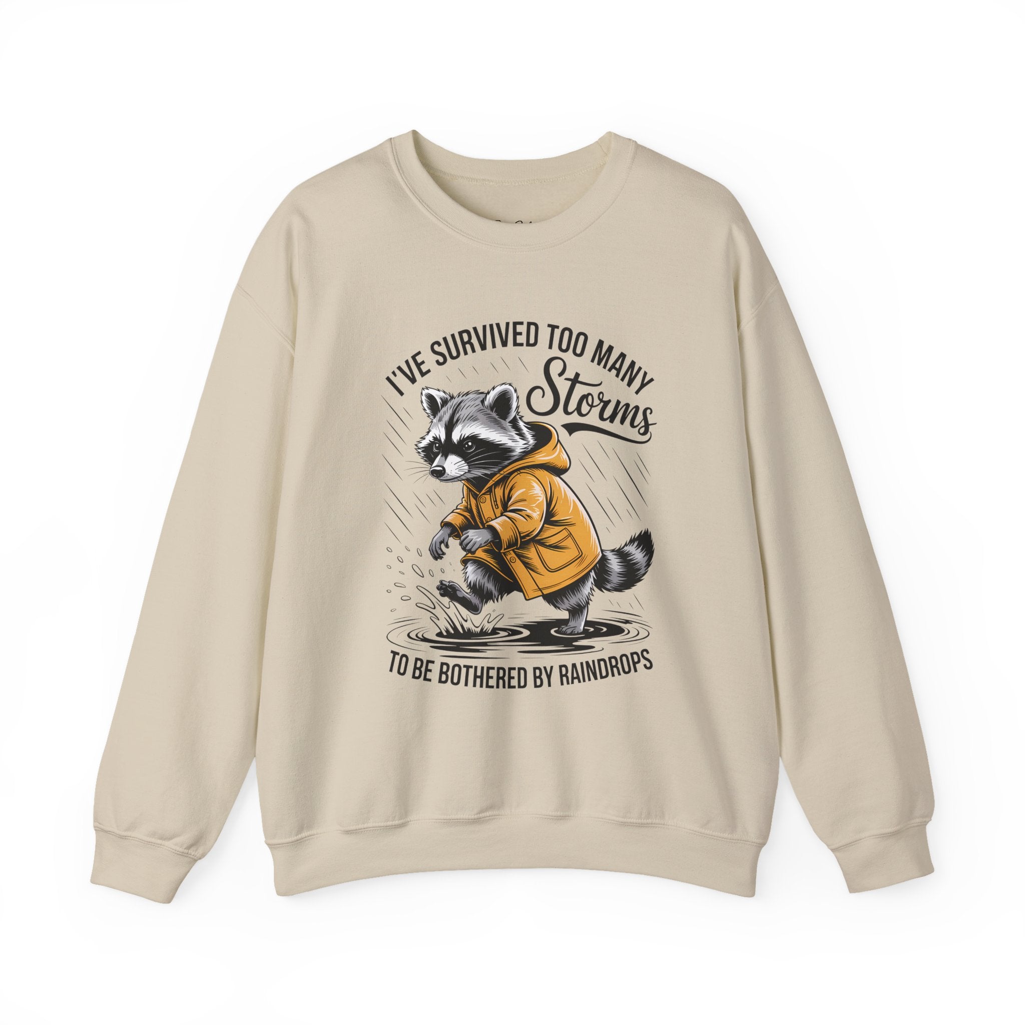 Crewneck Sweatshirt — "I've Survived Too Many Storms" Raccoon Graphic Unisex